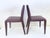 Two B&B Italia Vol au Vent side chairs. Designed by Mario Bellini, 2001. Bordeaux leather. Good used condition. Light...