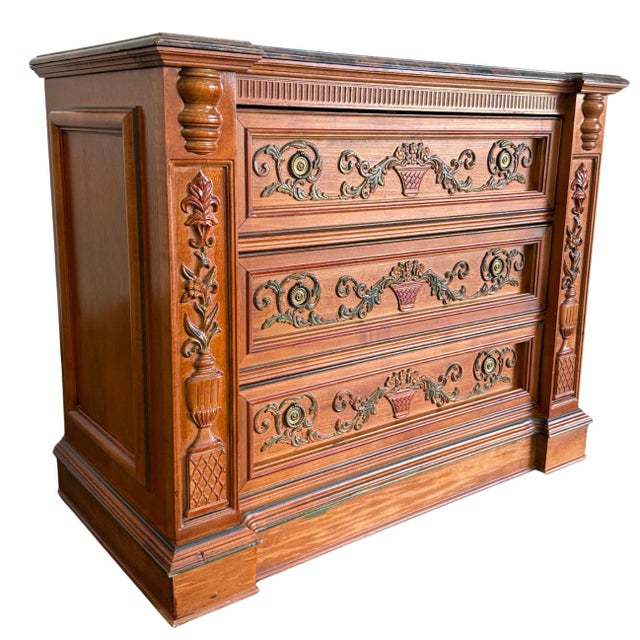 A grand Italian Renaissance Revival style three-drawer commode or accent chest by Pulaski. Topped with a thick,...