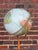 This vintage Replogle floor globe features a pristine globe mounted on a slender tapered wood pole situated on a brass...