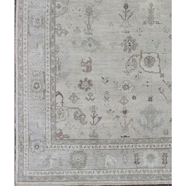 Large Angora Oushak Rug by Keivan Woven Arts, with Floral Bouquet Motifs in Gray, Taupe & tan and lavender Measures: 12'5...