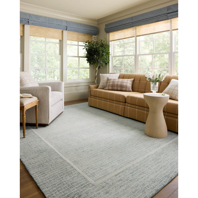 The Briggs Collection by Chris Loves Julia x Loloi is a beautifully detailed area rug with a soft, muted palette and...