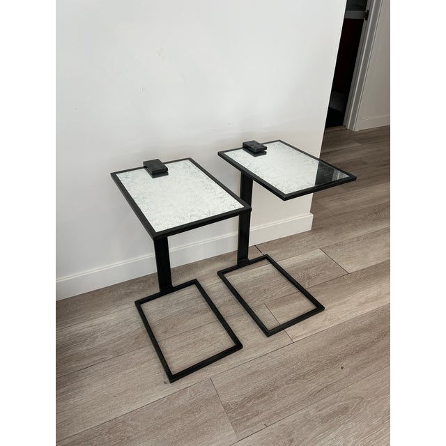 Our table's slim cantilevered form reflects the influence of modern architecture on midcentury design. The rich metallic...