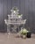 A charming English late Victorian era three-tier garden plant stand etagere or jardinière. The stand is constructed in a...