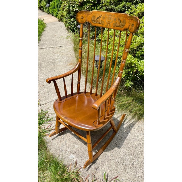 Offered is an Hitchcock “Faithful” rocker in the harvest finish as shown in Hitchcock’s 1970’s catalog. The chair is made...