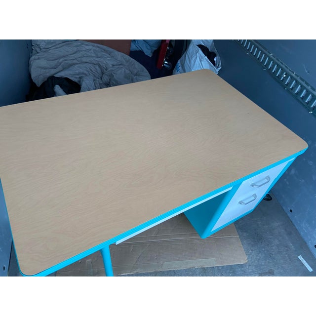 This Vintage Mid Century Modern Metal Teachers Desk is a unique and stylish piece of furniture for any workspace. With its...