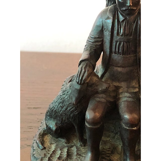 A beautifully crafted Black Forest hand carved walnut hunting presentation cup, the basket weave bowl supported by the...