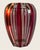 6.5” high, cranberry stripes all around in a molded Art Deco design, the model line of this vase is called Jemeppe which...