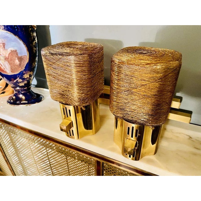 Beautiful wall sconce, in perfect condition. It is a wall sconce that has two lampshades. I have official proof of...