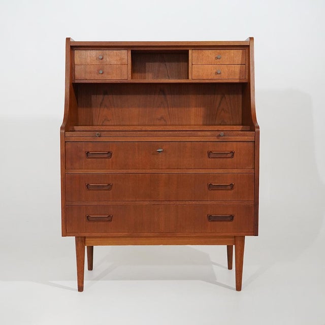 Designed by Gunnar Nielsen Tibergaard and manufactured by Tibergaard in the 1960s, this teak secrétaire belongs to the...