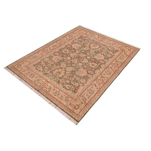 Designed with mesmerizing intricacy and gorgeous color palette, this hand-knotted masterpiece demonstrates the beauty and...