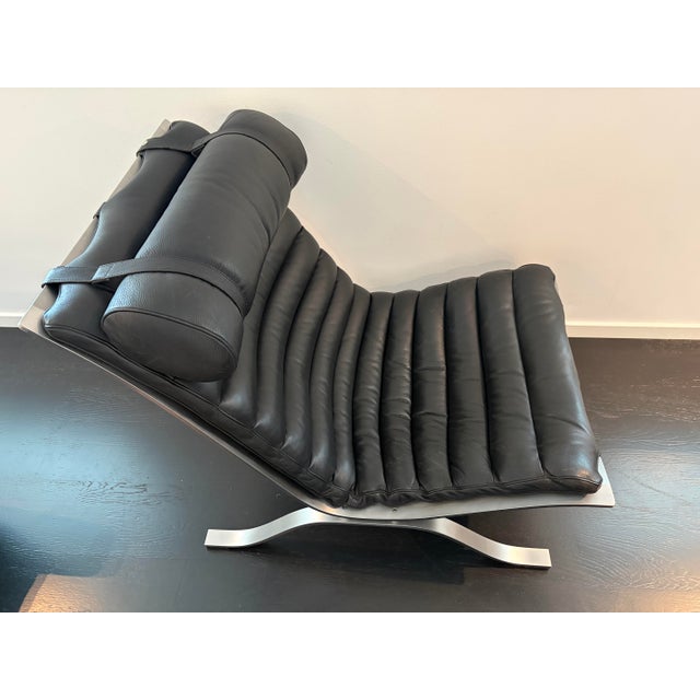 Material: matt chromed spring steel, leather dimensions: w: 65 cm, d: 96 cm, h: 77 cm. this piece has an attribution mark,...