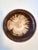 Deep, handcrafted, and signed bowl in dark earth tones. The interior surprises with a vibrant gradient glaze and a...