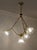 Vintage Italian chandelier from the 1950s, made of brass and Murano glass. The brass structure is composed of three arms...