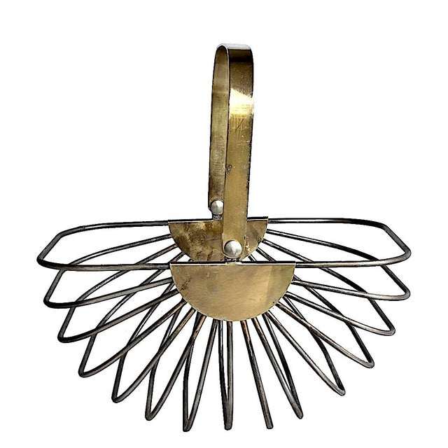 Offered is a chic geometric design stainless steel wire bread/fruit basket with a folding brass plated handle and half...
