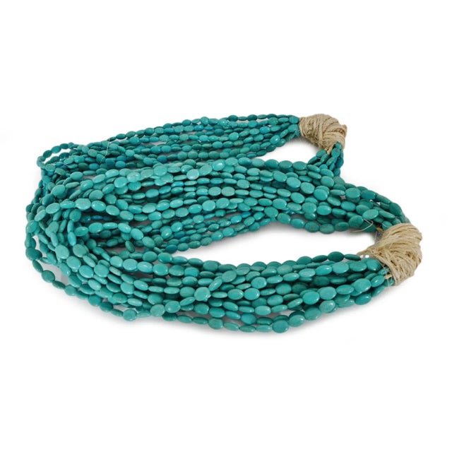 Striking decorative turquoise bead grouping of 13 strands. Each bead size is 1/2". Each grouping sold individually.