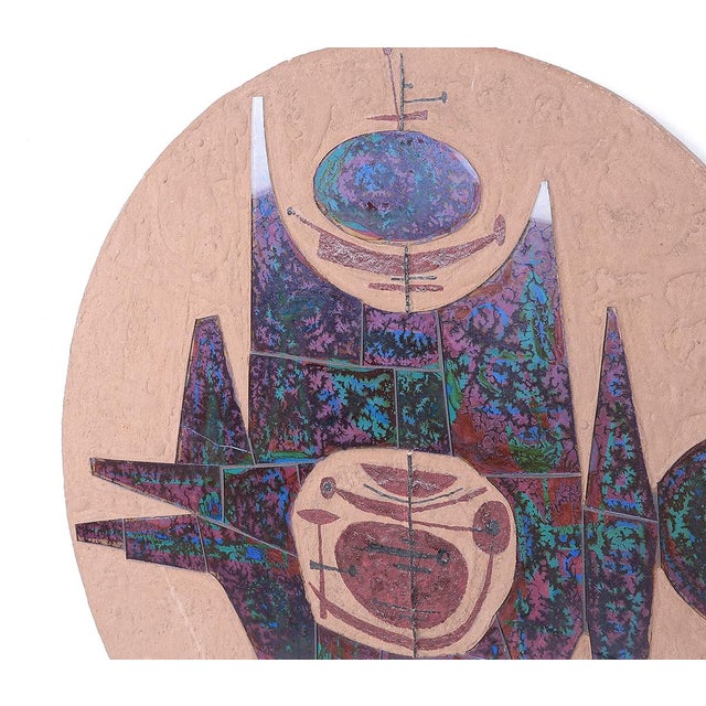 Unique wall panel/plaque made in the 1960s/70s. The round panel is made of wood that has been decorated with a kind of...