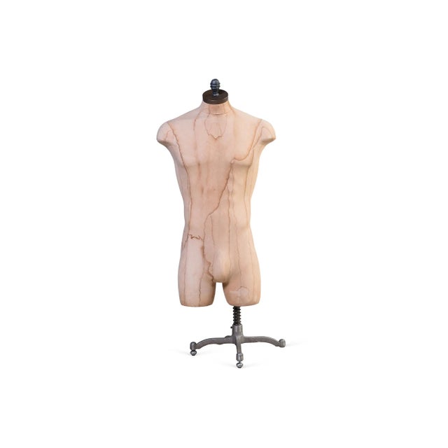 This is a male mannequin on an adjustable 50-65"H stand. It is a perfect item to use for displaying outfits. Note, a...