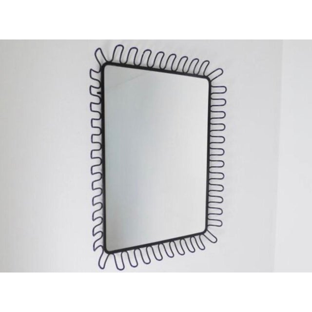 Vintage wall mirror produced by ikea, sweden, during the late 1980s or early 1990s. The mirror features a distinctive...