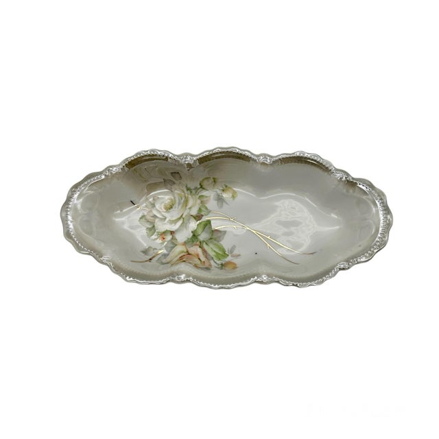 Beautiful Victorian-styled scalloped lusterware bowl with floral designs and gold details. You can use it to decorate, as...