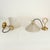 A refined and elegant set of 5 wall sconces, a perfect example of Italian lighting excellence from the Midcentury/Space...