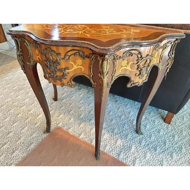 Brown Louis XV–style Marquetry Console Table With Decorative Gilt-Metal Mounts For Sale - Image 8 of 9