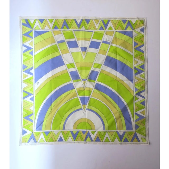 A chic neck, head, handbag, etc., scarf from fashion house Emilio Pucci. Scarf measures 17.88" square. A beautiful...