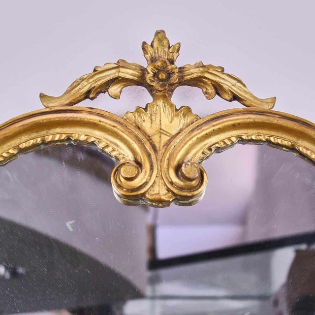 Vintage distressed gilded wooden mirror Height: 102 Width: 88 This piece is attributed to the mentioned designer/maker. It...