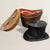 This late 19th-century English leather top hat box, paired with an American-made beaver fur top hat, exudes timeless...