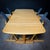 This set of Knokke is made of beech wood and maple wood. The seats are again upholstered. The table can be shortened...