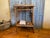 A tea trolley, also known as a table à tisane, from the aesthetic movement of late 19th-century France, also called the...