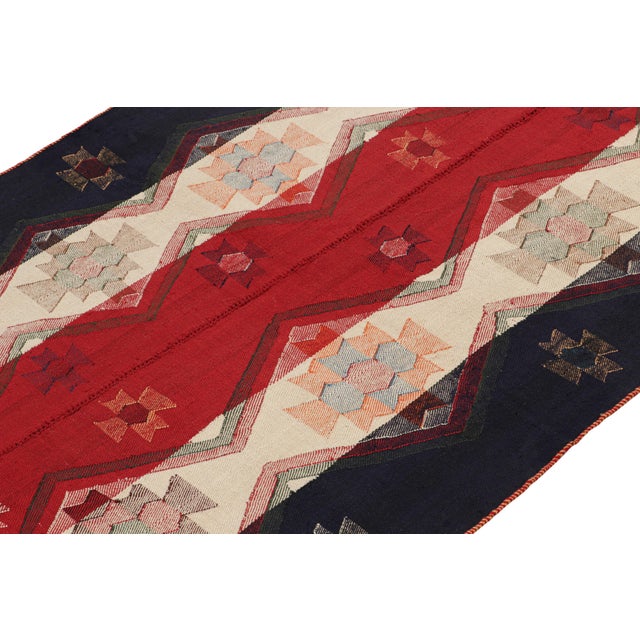 This vintage 5x7 Jajim-style Persian Kilim is believed to be a Qashqai tribal rug of rarity for its provenance. Handwoven...