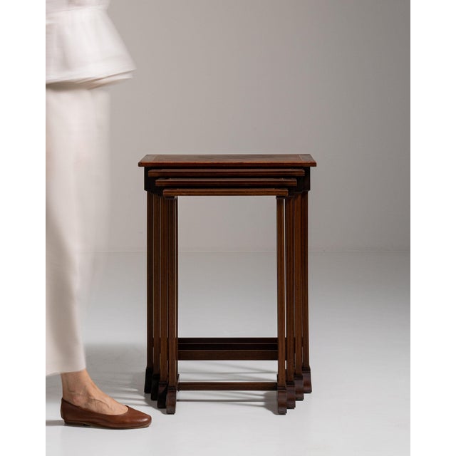 Carved walnut console table in Rich Walnut Brown. The rich walnut brown surface highlights fluted colonnade legs, simple...