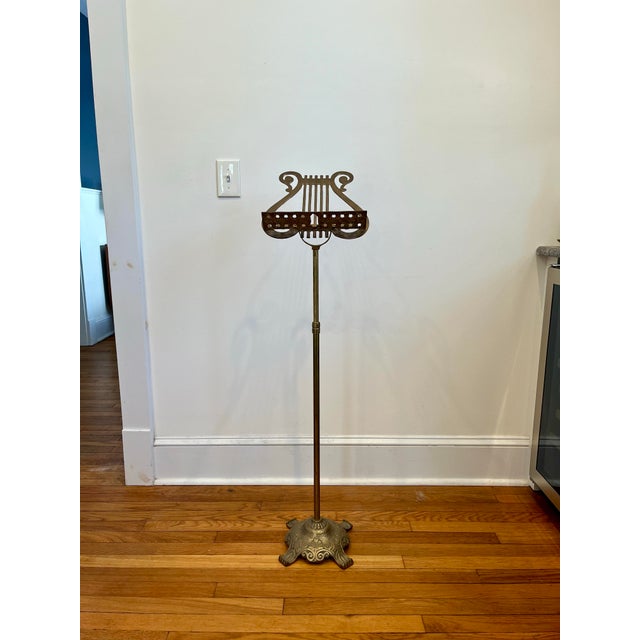 Display your music score or a book on this decorative, antique stand! Crafted in France, circa 1950, the music stand sits...