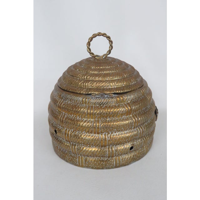 This gorgeous Mottahedeh Beehive Box is made of brass and features 3 decorative brass bees secured with a screw to the...