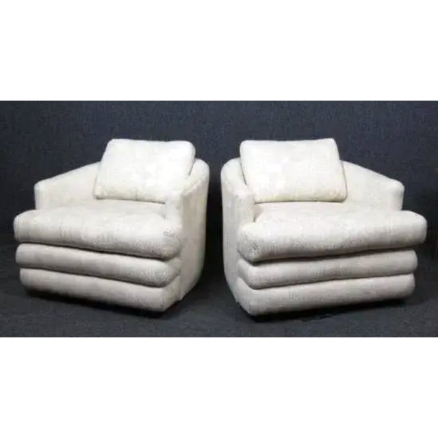 Awesome pair of plush lounge chairs with a funky, snakeskin-like fabric. Oversized, cushy seats sure to provide hours of...