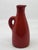 This pitcher boasts a magnificent, intense, and vibrant red, a particularly rare and sought-after color in the work of...