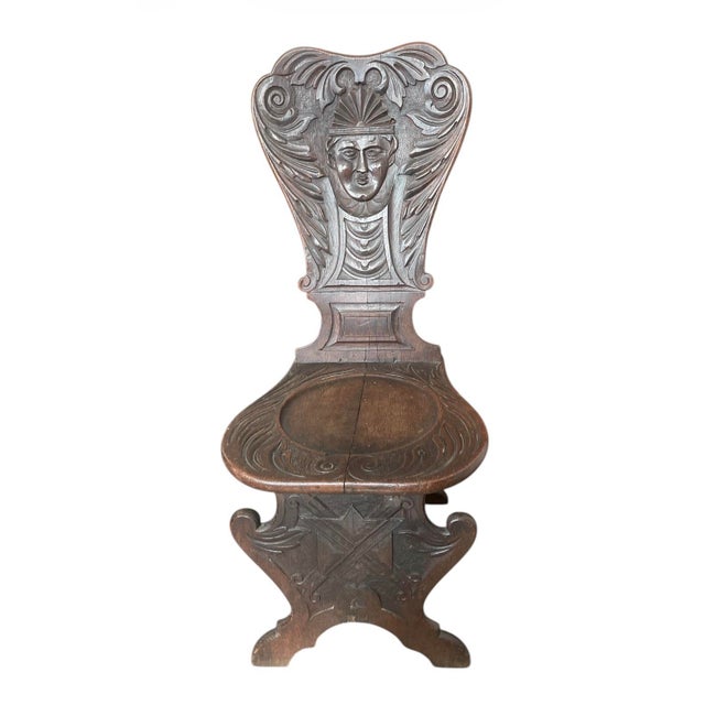 Italian Renaissance Style Walnut Sgabello Chair Hand-carved from solid walnut with a rich, aged patina and visible natural...