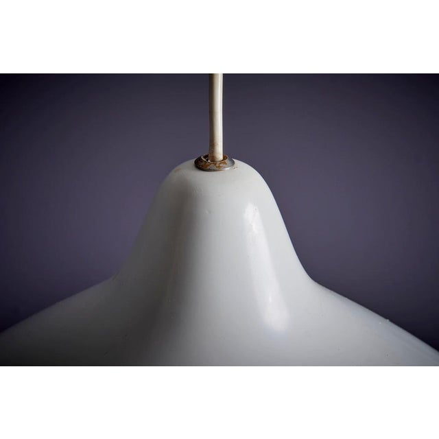 Lisa Johansson-Pape White Pendant Lamp in Aluminum, Finland 1960s. Lisa Johansson-Pape, a Finnish designer (1907-1989), is...