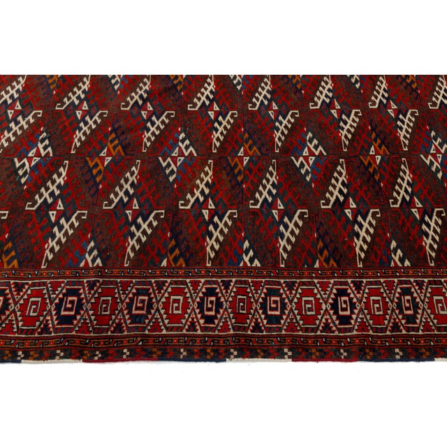 Antique Turkmen Yamoud Wool Rug With Diamond Lattice and Eagle Motif Borders For Sale - Image 11 of 12