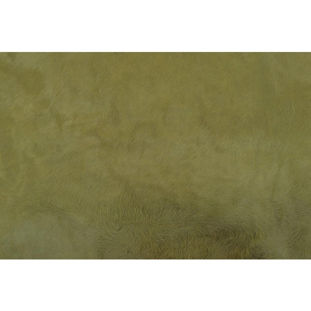Originating from Brazil, this 7x8 premium Cowhide Solid Rug is a sleek addition to Rug & Kilim’s Contemporary collection....