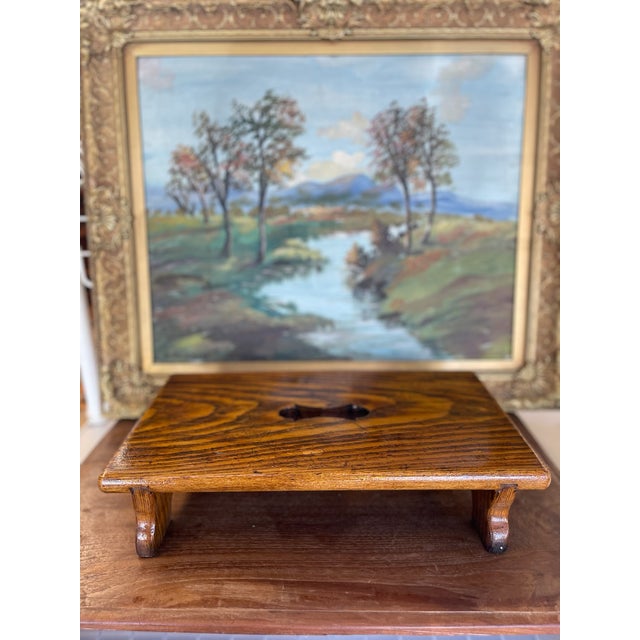 Mid-20th century handcrafted likely oak footstool showcases classic American craftsmanship with rustic charm and...