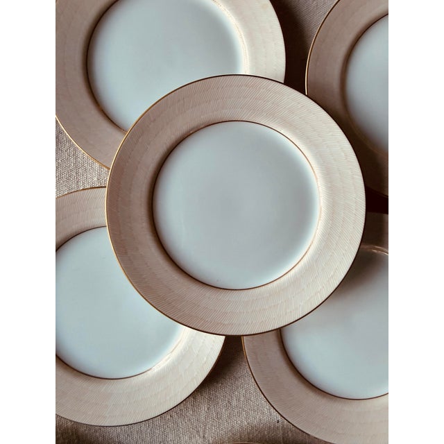 This is a set of eight vintage salad or dessert plates by Fitz and Floyd in the beloved Adobe Peach pattern. Each plate...