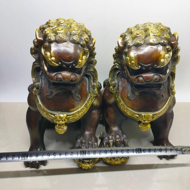 Mid 20th Century Pair of Vintage Chinese Gilt Bronze Guardian Lions (Foo Dogs) on Embroidered Balls For Sale - Image 5 of 9