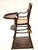 On trend antique Arts and Crafts childrens high chair Crafted from wood with whicker seats Very solid and sturdy....