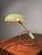 Rare early table lamp model Scrittoio 12297 designed by Angelo Lelii for Arredoluce in 1949. This elegant desk lamp...