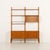 The scandinavian mid-century teak free-standing wall unit was crafted by sven andersen møbelfabrikk, a prominent norwegian...
