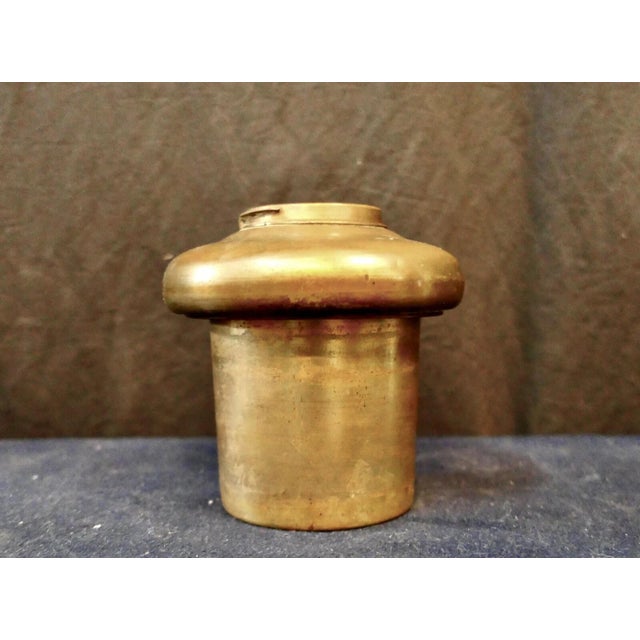 This vintage circa late 19th century Tiffany Studios kerosene oil can has distinctive markings stamped on its drilled...