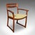 This is a pair of vintage side chairs. A Scottish, teak elbow seat with Scandinavian influence, dating to the mid 20th...