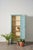 Early 20th century English pine cabinet with beautifully weathered blue paint, warm patina, two paneled doors, and...
