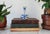 Vintage miniature ceramic blue and white bud vase by Delft. One chip on base. Pictured. Makers mark on bottom.